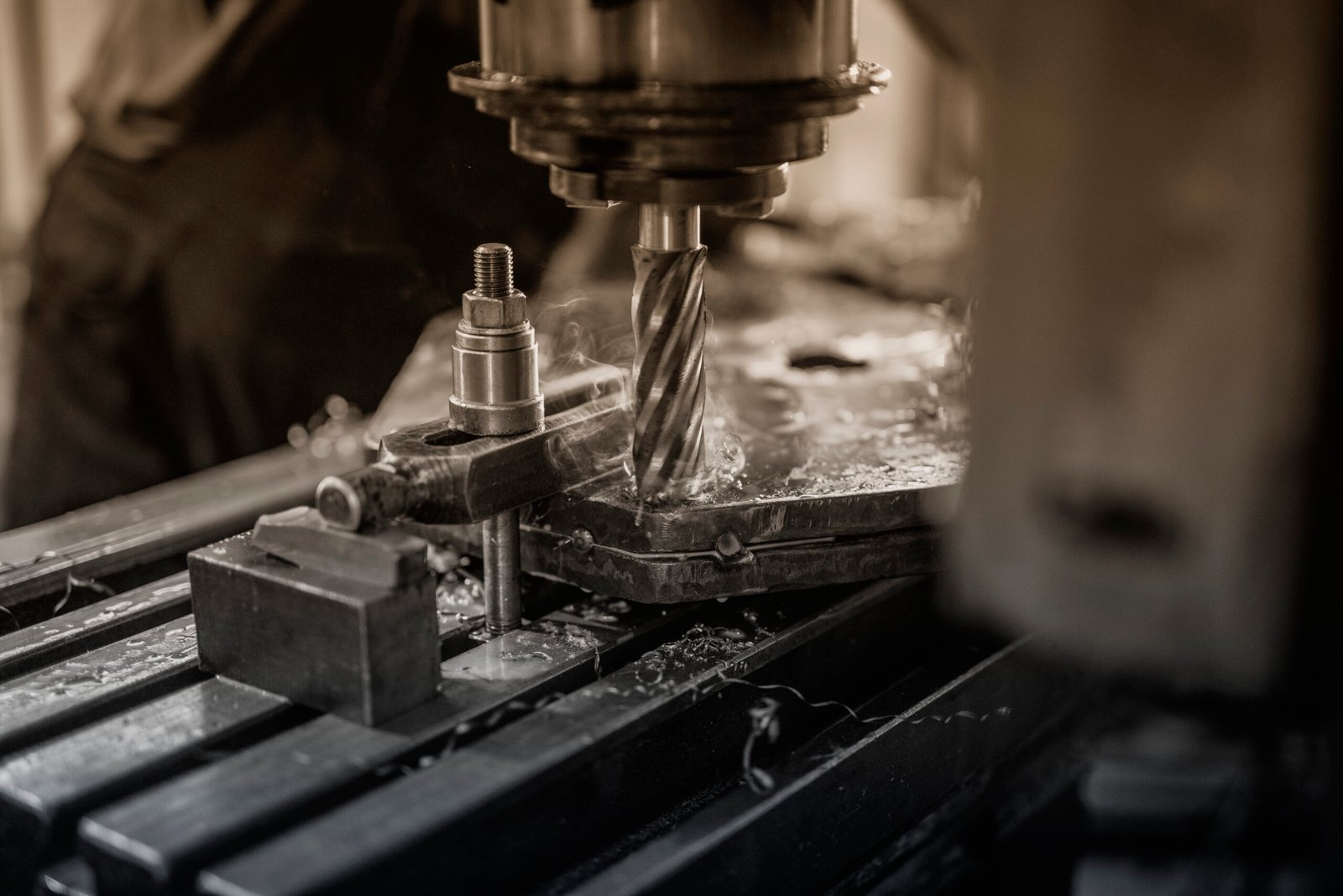 Industrial machine drilling metal.